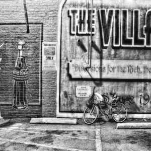 Village Cafe Wall - by Lloyd Chaser